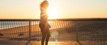 Woman rollerblading during sunrise