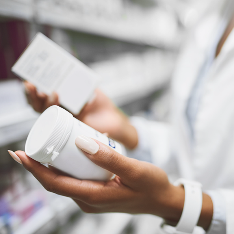 Woman holding some medicine