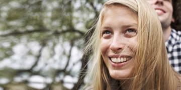 Woman smiling outdoors