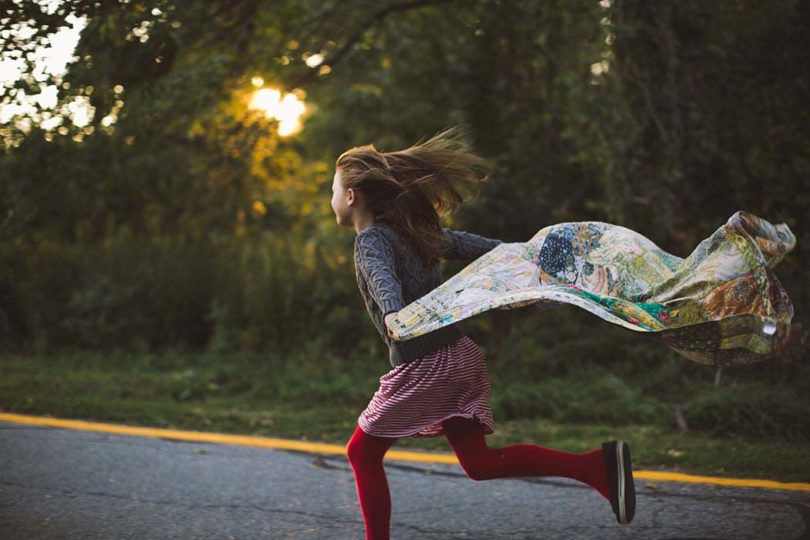 Girl running in the wind